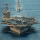 Illustration for article titled Navy Hornets Mock-Dogfight With Malaysian Flankers In South China Sea